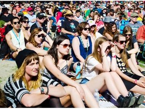 A general view of the crowd at stage four listens to  the workshop titled Fables of the Reconstruction at the Calgary Folk Music Festival on Friday, July 26, 2013. The folk fest wants to help share your best memories of the event on social media.