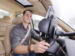 Ben Gleitzman uses traffic and navigation app Waze as he drives to work in Menlo Park, Calif.