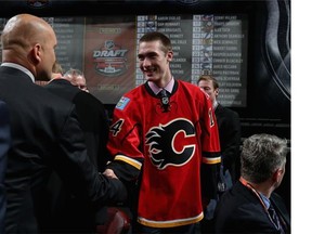 Goalie Mason McDonald meets his new team after being drafted 34th overall by the Calgary Flames on Day 2 of the 2014 NHL Draft at the Wells Fargo Center in Philadelphia.