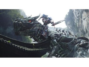 Grimlock and Optimus Prime put on a show in Transformers: Age of Extinction, starring Mark Wahlberg.