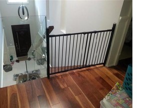 Glass mount black: For parents living in a home with staircases, baby gates have become a necessary part of raising a small child. THE CANADIAN PRESS/ho-Kiddie Proofers