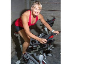 Helen Vanderburg gets her heart pumping on a stationary bike at Heaven’s Ftiness in Calgary.