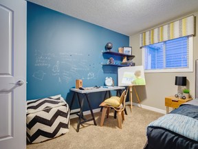 Two secondary bedrooms are side-by-side off the upstairs hallway.