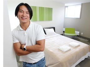 Hostelling International manager Jason Wong in one of the new private rooms in the newly reopened hostel on June 3. (Colleen De Neve/Calgary Herald)