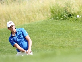 Jack Wood, of Banff Springs, plays hole 18 during the first round of the 2014 Sun Life Financial Alberta Men’s Amateur Championship at Desert Blume Golf Club in Medicine Hat on Tuesday.