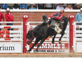 Jake Vold from Ponoka hangs on for a lead during the Bareback championship on Sunday.