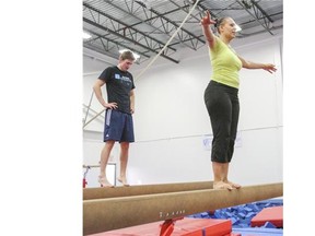 A group of adults participate in an an adult fitness class at Kyle Shewfelt Gymnastics in Calgary.