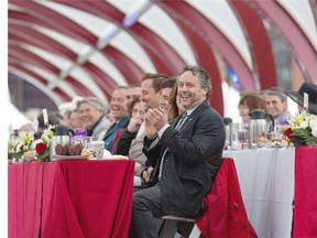Brett Wilson enjoys a laugh during the inaugural Peace Bridge breakfast, the brainchild of Calgarian community leaders George Brookman and Wilson, in Calgary on Saturday June 21, 2014.