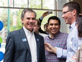 Jenn Pierce, Calgary Herald Calgary, AB; JUNE 13, 2014  --  Jim Prentice meets with supporters at his campaign office's official opening for in Calgary on Friday June 13, 2014. (Jenn Pierce/Calgary Herald) For City story by . Trax # 00056362A