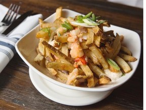 A lobster poutine from Symons Roadhouse in Calgary on Friday May 9, 2014.