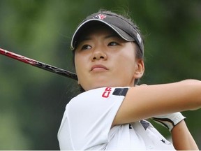 Jennifer Ha of Calgary watches her tee shot on the 10th hole during final round play at the Canadian Pacific Women’s Open golf tournament in London, Ont., on Sunday.