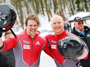 Jesse Lumsden, left, seen with Lyndon Rush during a silver medal win at a 2012 bobsleigh World Cup in Germany, is also an avid golfer.
