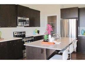 Josh Skapin/Calgary Herald The kitchen in the Mossberg by Lifestyle Homes in Cooper’s Crossing.