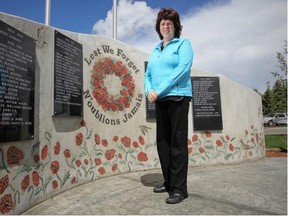 Judy Carleton, with the Blackfalds war memorial she helped have built in Blackfalds, Alberta Monday, June 9, 2014.