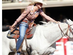 Kaley Bass of Kissimmee, Fla., won the Calgary Stampede barrel racing crown with a score of 17.61 and the top prize of $100,000 on Sunday.