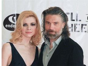 Kasha Kropinski and Anson Mount pose on the red carpet at the Hell on Wheels Season 4 premiere for cast and crew at Telus Spark on Saturday evening July 26, 2014.
