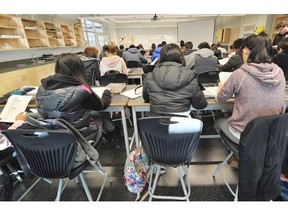 Kids at University Hill Secondary work in their classes  in Vancouver  on February 25, 2014.