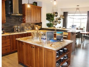 The kitchen in the Converge show home by Jayman MasterBuilt in Sunset Ridge in Cochrane. Andrea Cox for the Calgary Herald