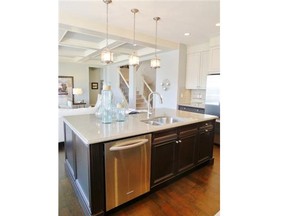 The kitchen in the Grant show home by Homes by Avi at the Shores of Westermere in Chestermere. Claire Young, Calgary Herald