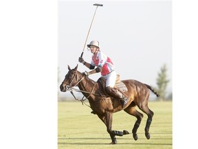 Kyle Fargey plays a polo match at the Calgary Polo Club near De Winton earlier this month.