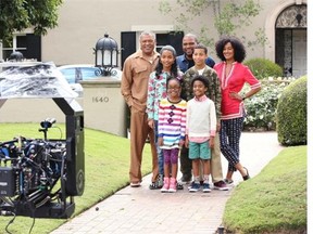 Laurence Fishburne, left, co-stars on Black-ish, ABC’s new family comedy about one man’s determination to establish a sense of cultural identity for his family.