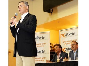 PC leadership candidates Jim Prentice in front, Thomas Lukaszuk and Ric McIver attend a forum at the party’s Calgary policy conference on May 31.