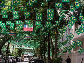 Rio de Janeiro's Honorio de Barros street is decorated with Brazilian national flags and those of the other countries participating in the FIFA World Cup Brazil.