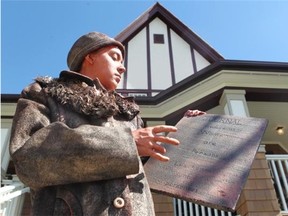 A living statue of Nellie McClung stood outside the building at the opening of the official opening of the Famous 5 Centre of Canadian Women at Heritage Park on June 20, 2014. The replica home is of Nellie McClung’s former Calgary residence.