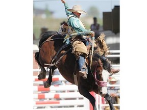 Dustin Flundra of  Pincher Creek rode Stampede Warrior to the Calgary Stampede title with a score of 89.00 on Sunday, which got him into a tiebreaker, which he won.