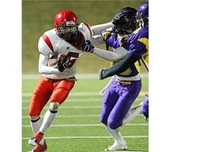 Matt Webster, seen rushing against Central Memorial’s Adam Osterling during 2009 Calgary high school action as a member of the Western Canadian Redmen, was chosen in the fifth round of Tuesday night’s CFL draft after a solid university career at Queen’s.