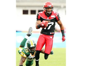 Maurice Price breaks a tackle during the Labour Day game last season and runs for a touchdown against the Edmonton Eskimos.