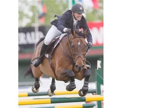 McLain Ward of the United States competes in the ATB Financial Cup riding Zander at Spruce Meadows in Calgary on Wednesday. After winning two events earlier in the day, he couldn’t make it three-for-three as Canadian Eric Lamaze won the ATB Financial Cup.
