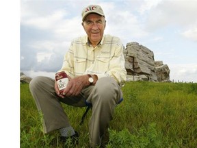Ed McNally, founder of Big Rock Brewery, photographed in 2005 in front of the Big Rock in Okotoks, has died.