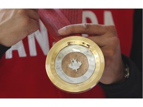 The medal, made of Canadian Maple wood, silver and gold, was conceived by the Toronto design firm Jacknife.