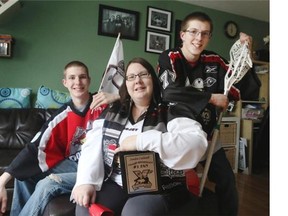 Members of the Caldwell family, from left, Mitchell, mom Sondra and Brandon will be in their seats at the Scotiabank Saddledome on Saturday night as their beloved Roughnecks take on the Rochester Knighthawks in Game 1 of the Champions Cup finals