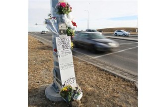 A memorial at the site of the fatal crash at the intersection of Shaganappi Trail and Country Hills Boulevard N.W. in 2012. (Calgary Herald/File)