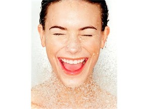 Model Brooke Tobolka smiles while splashing water on her face. Beauty these days embraces an array of facial features, but there’s no leeway when it comes to complexion. Healthy-looking skin is a must. (DA) AP PL KD 2000 (Vert) (lde) (Additional photos available on KRT Direct, KRT/PressLink or upon request) -- NO MAGS, NO SALES -- (At-Risk)*DATE PUBLISHED MONDAY, OCTOBER 24, 2005* **CALGARY HERALD MERLIN ARCHIVE** **CALGARY HERALD MERLIN ARCHIVE**