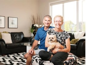 Don Molyneaux for the Herald 
 Dave Levesque and Toni Jaques with their dog at their home in the Clearbrook Villas.