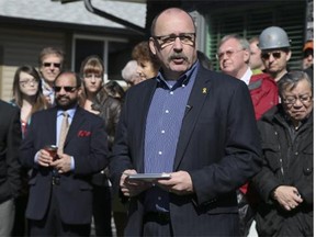 MLA Ric McIver announces his candidacy for the leadership of the Alberta Conservative party in front of his home in Calgary, Wednesday, May 7.