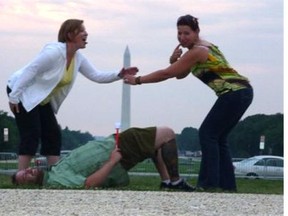 This photo showing Crestomere School principal Penny Mueller (left) was posted on the Facebook page of teacher Marti Ingram, on right, in July, 2009 where it was seen by surprised parents and former students who were her friends. The staff of Crestomere School were attending a taxpayer-funded conference in Washington D.C.