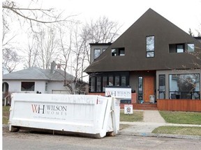 Large dump boxes like these are common in river neighbourhoods such as Rideau Park, a community that was affected by last year’s flood, and where flood-inspired zoning ammendments could affect future renovations of existing homes.