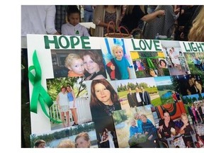 Hope. Love. Light. A picture card of the family, at Thursday night's candlelight vigil in Parkhill for missing Nathan O'Brien, 5, and his grandparents, Alvin and Kathy Liknes.