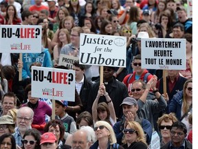 People take part in the "March For Life" on Parliament Hill in Ottawa on Thursday, May 8, 2014.