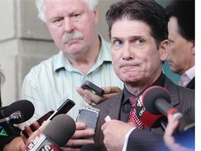 Kim Ross, defence lawyer for Douglas Garland, speaks to media at the Calgary Courts Centre on July 16, 2014.