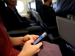 Canadian Transport Minister Lisa Raitt says regulations are being changed to permit the use of video games, tablets, computers and cameras at any time during a flight, including during takeoff and landing.