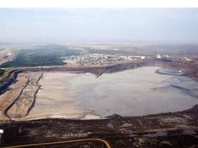 A tailings pond is picture at ythe Syncrude oilsands facility seen from a helicopter near Fort McMurray, Alta.