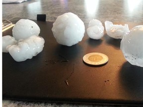 Airdrie Hail storm this afternoon. Golf ball size hail.