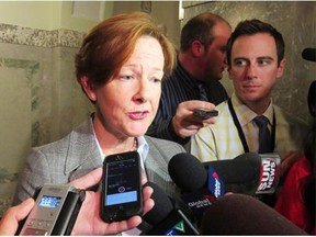 Alison Redford faces the press