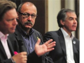 PC leadership candidates Thomas Lukaszuk, left, and Ric McIver, seen earlier this month, spoke to a gathering of Canadian Association of Petroleum Producers on Wednesday. Jim Prentice had a scheduling conflict.