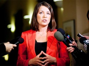 Wildrose Leader Danielle Smith says people from the Prentice leadership campaign have urged her to merge Wildrose with the PC party.